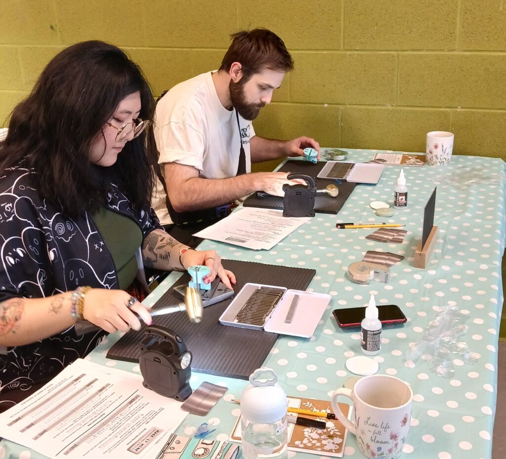 Toronto team building workshop participants creating personalized bracelets